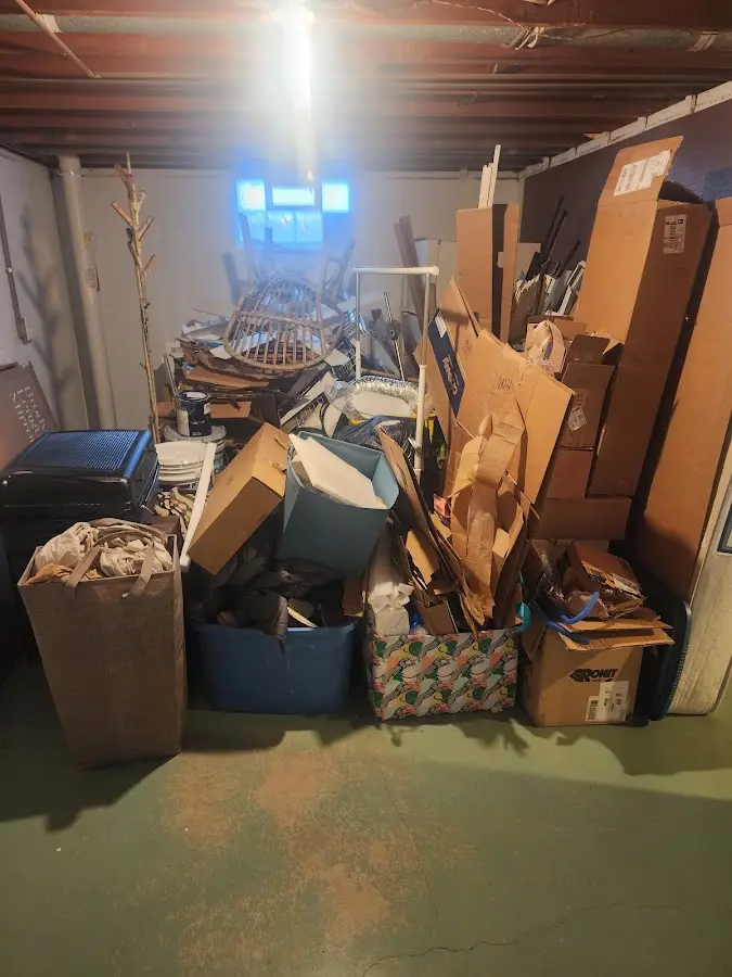 Roll-off dumpster container at job site for Yard Waste Dumpster Rental in Fox Farm-College